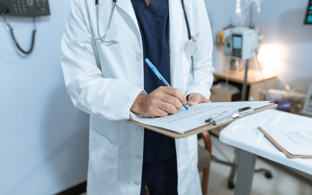 Healthcare professional filling out payer enrollment